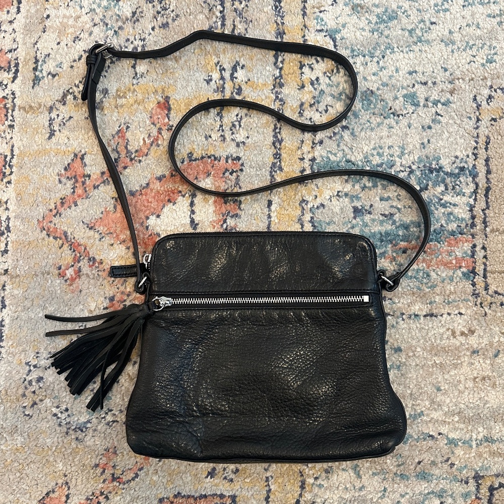 Margot pebbled black leather cross body with leather tassel w/silver hardware